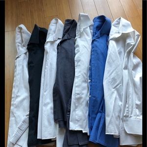 Lot of J. Hilburn button down shirts.